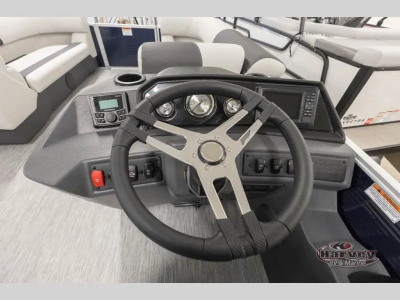 Slide: The Image of Steering wheel and dashboard of a 2026 S Series 22 SF boat. - 17