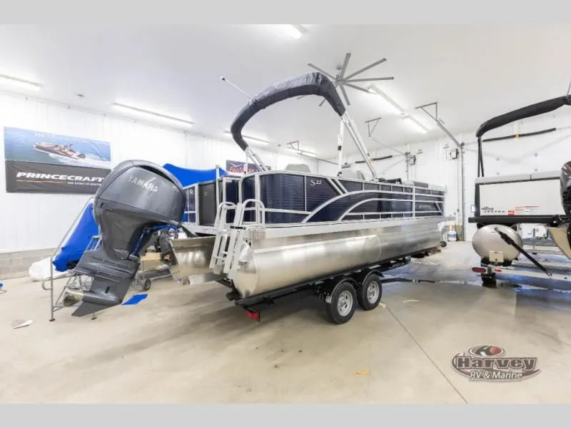 Slide: The Image of 2026 S Series 22 SF pontoon boat in a showroom. - 6