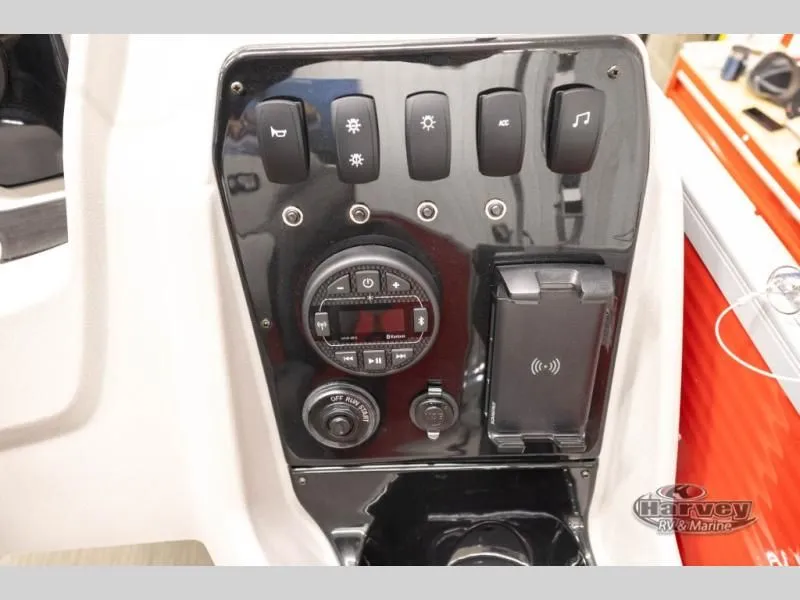 Slide: The Image of Vectra Classic 19 L 2026 control panel with switches and charger. - 20
