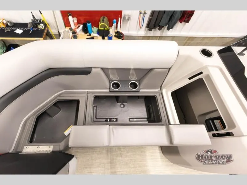 Slide: The Image of Interior of 2026 Vectra Classic 19 L with storage and cup holders. - 23