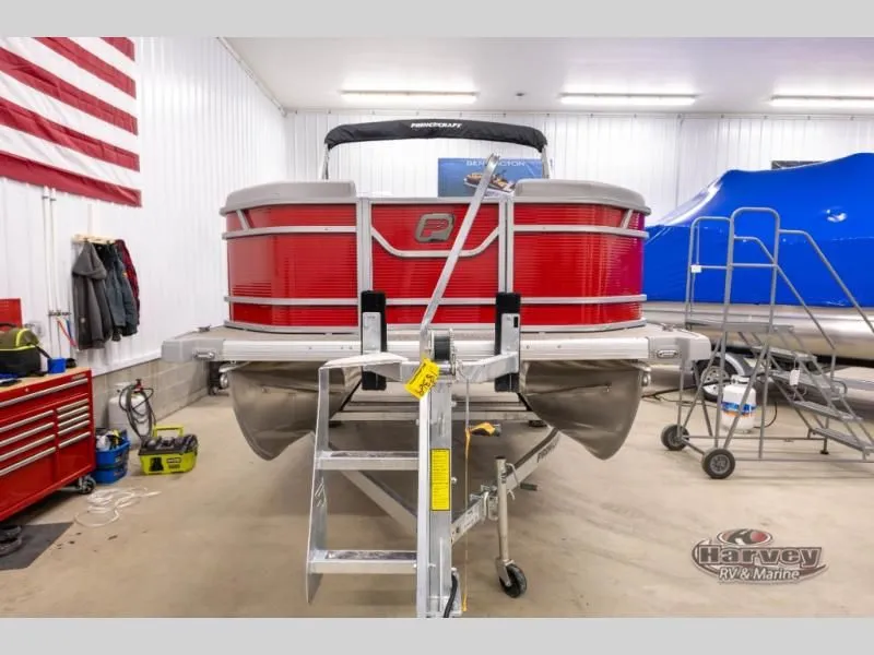 Slide: The Image of Red Vectra Classic 19 L boat in workshop, 2026 model. - 3