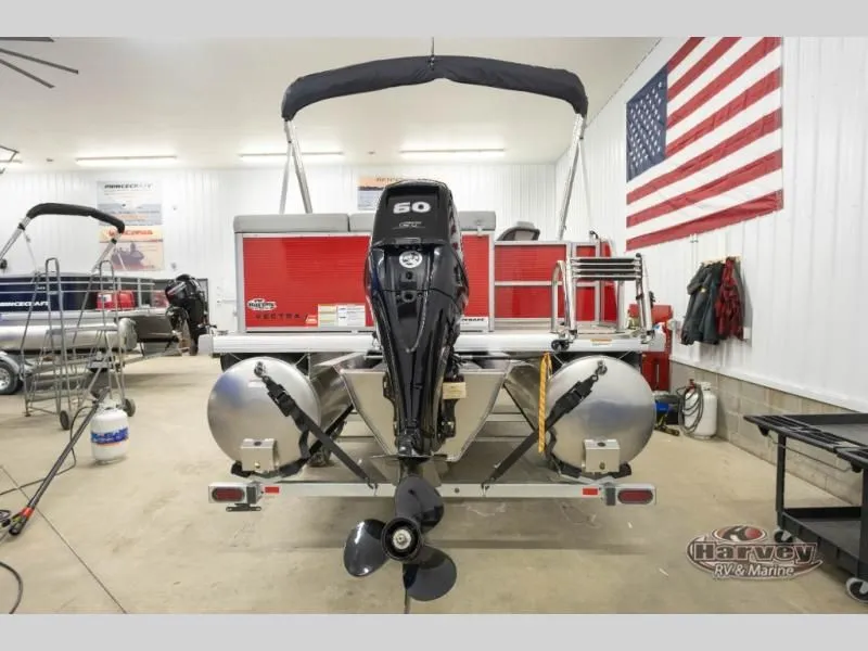 Slide: The Image of 2026 Vectra Classic 19 L boat in showroom with outboard motor. - 7