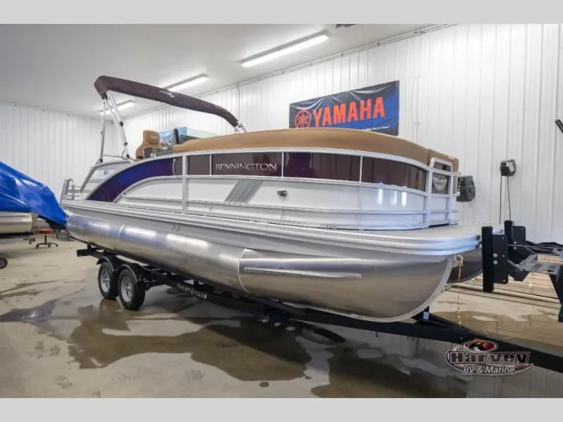 The Image of Bennington pontoon boat in warehouse, M Series 22 ML model, year 2026. - 1