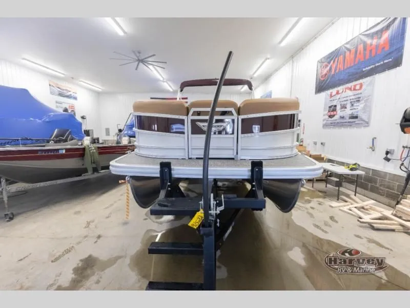 Slide: The Image of 2026 M Series 22 ML boat in a workshop. - 7