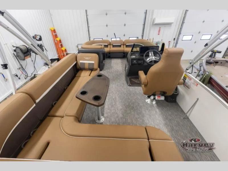 Slide: The Image of Interior of a 2026 M Series 22 ML boat with brown seating. - 8