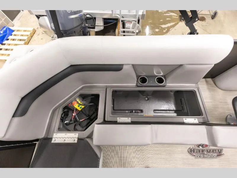 Slide: The Image of Interior of Vectra Sport 21 QL 2026 with storage and cup holders. - 14