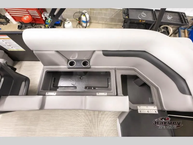 Slide: The Image of Interior of Vectra Sport 21 QL 2026 with storage and cup holders. - 16