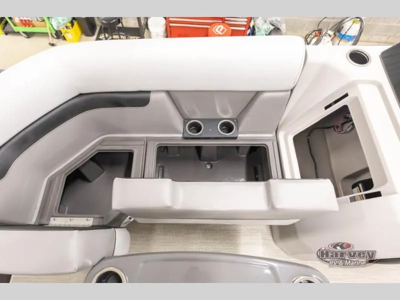 Slide: The Image of Interior of Vectra Sport 21 QL 2026 with storage and cup holders. - 22