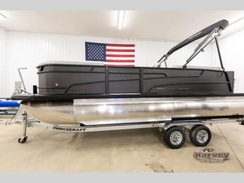 Slide: The Image of 2026 Vectra Sport 21 QL pontoon boat in a showroom with US flag. - 4