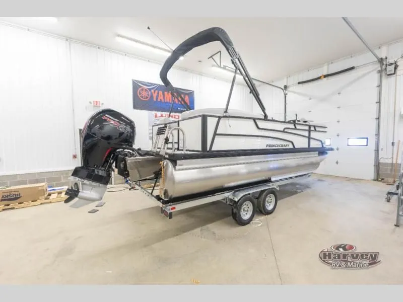 Slide: The Image of 2026 Vectra Classic 21 QL pontoon boat in a garage on a trailer. - 5