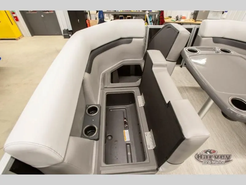 Slide: The Image of Interior of 2026 Vectra Classic 19 L with storage and cup holders. - 17
