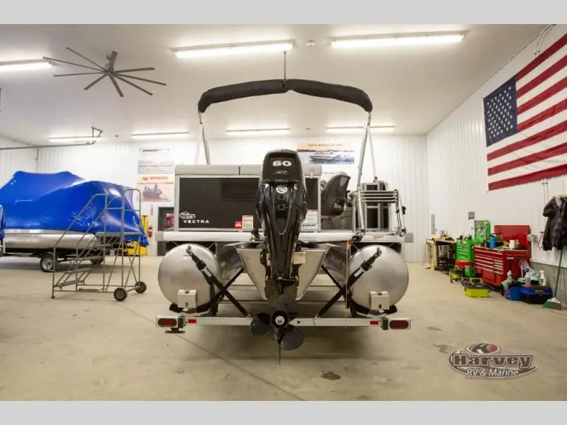 Slide: The Image of 2026 Vectra Classic 19 L boat in workshop with US flag. - 4