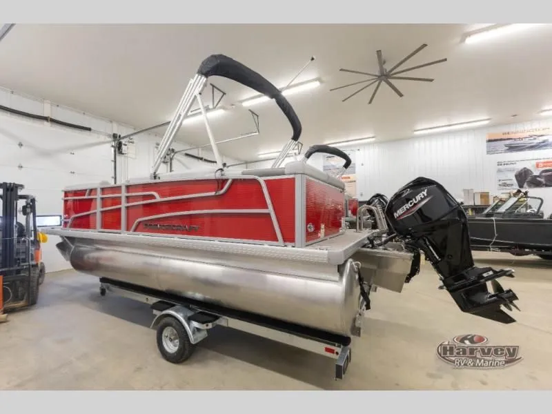 Slide: The Image of Red Vectra Classic 19 L pontoon boat, 2026 model, in a workshop. - 8