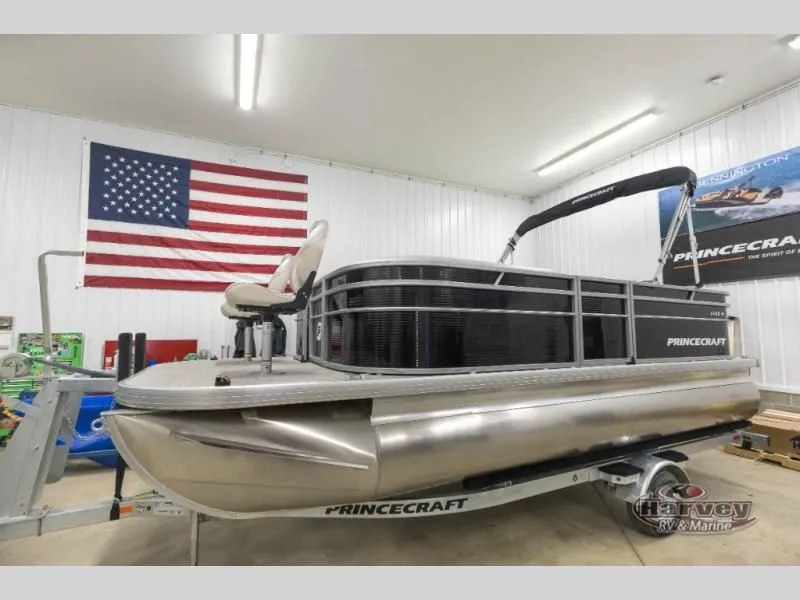 The Image of 2026 Jazz 19-4S pontoon boat in a workshop with US flag. - 1