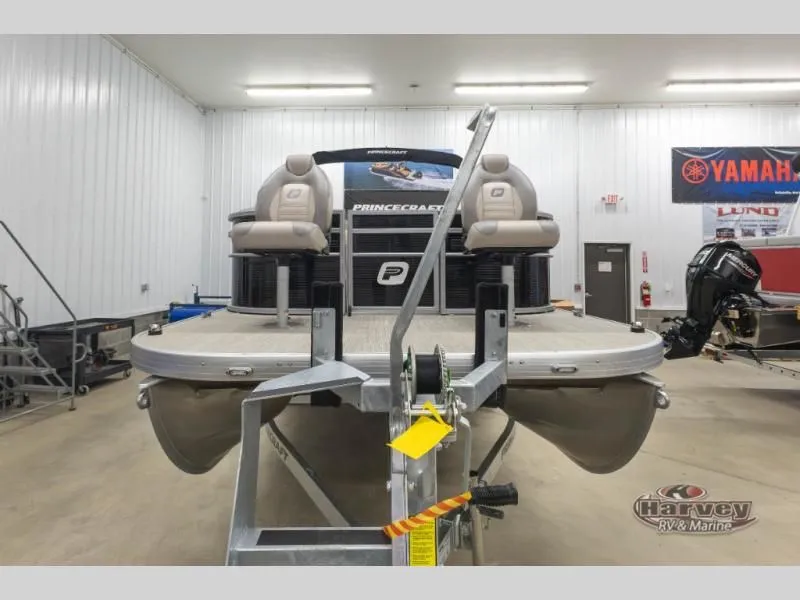 Slide: The Image of Princecraft pontoon boat in showroom with Yamaha motor. - 3