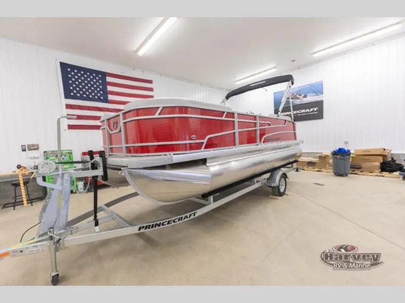 The Image of 2026 Vectra Classic 21 QL pontoon boat in a workshop with US flag. - 1