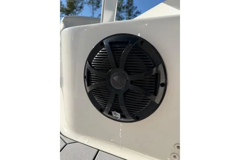 Slide: The Image of Black speaker on 2020 KenCraft 239 Bay Rider boat, mounted on white surface. - 14
