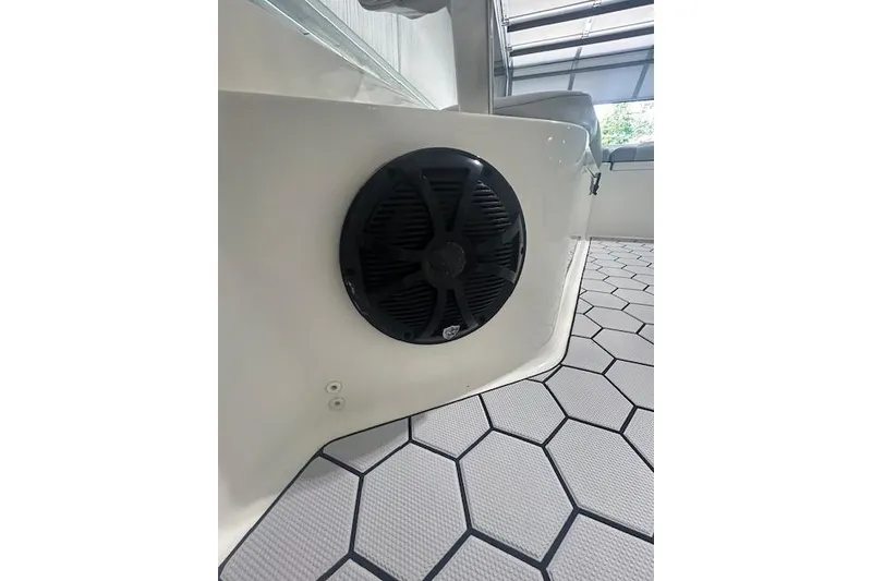 Slide: The Image of 2020 KenCraft 239 Bay Rider boat interior with speaker and hexagonal flooring. - 15