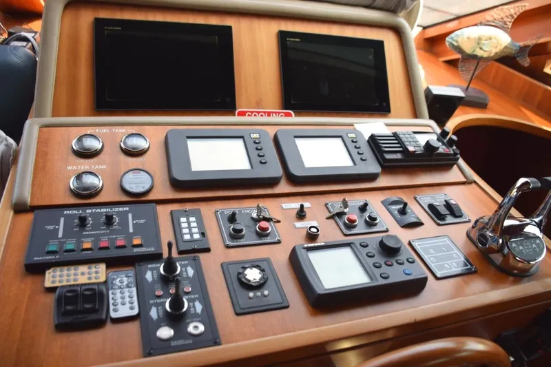 Slide: The Image of Lower helm - Garmin Nav screens, Naiad hydraulic bow / stern thrusters and stabilizers - 13