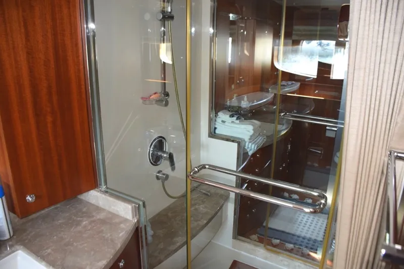 Slide: The Image of Glass shower between his and hers heads, note privacy curtain - 30