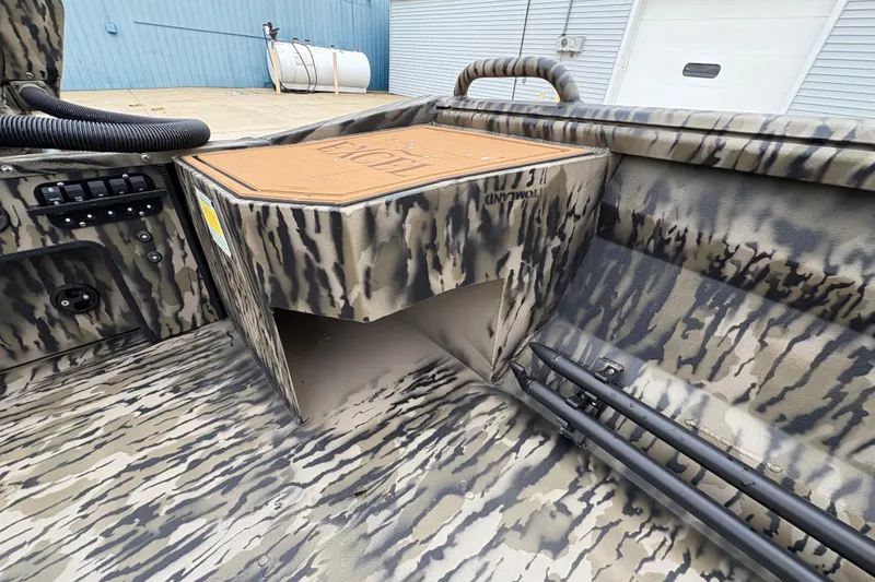 Slide: The Image of Camouflage interior of 2026 Excel 1860 F4 Pro boat with storage compartment. - 15