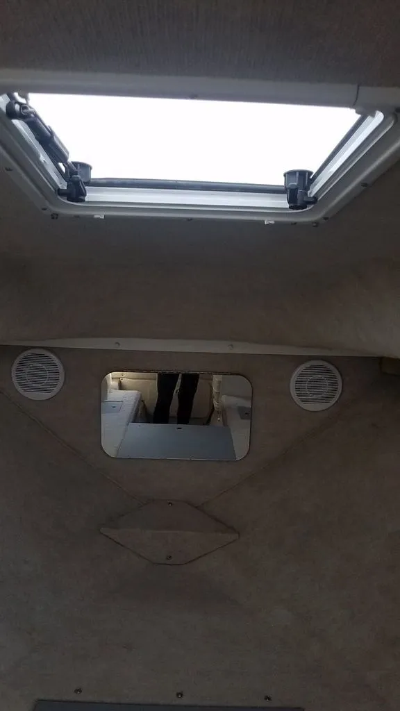 Slide: The Image of Interior of a 2003 Wellcraft 240 Coastal boat with a skylight. - 8