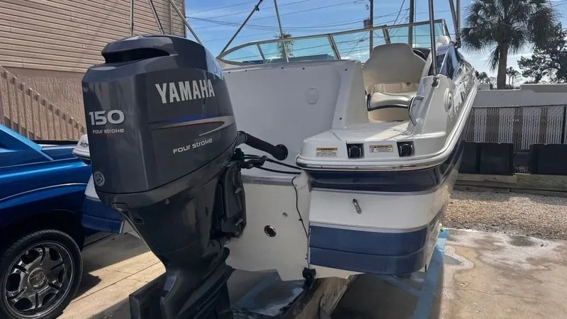 Slide: The Image of 2008 Hurricane Sundeck boat with Yamaha 150 outboard motor. - 2