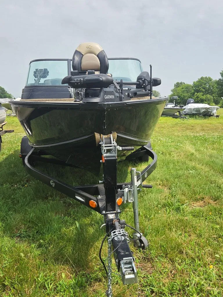 Slide: The Image of 2019 G3 Angler boat on trailer outdoors. - 2
