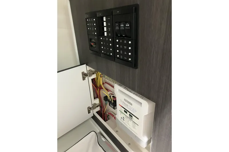 Slide: The Image of Electrical panel and wiring inside 2026 Albemarle 27 Dual Console boat. - 12