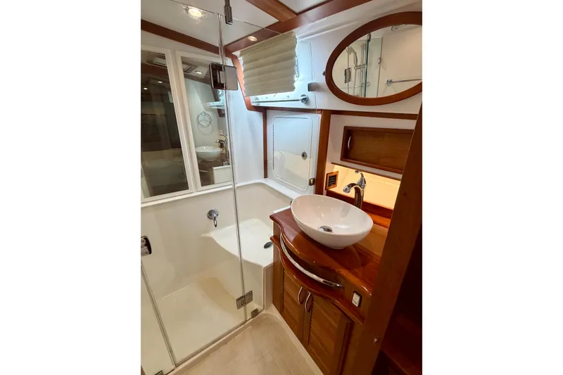Slide: The Image of Luxurious bathroom interior of 2016 Sabre 48 Salon Express yacht with modern fixtures. - 32