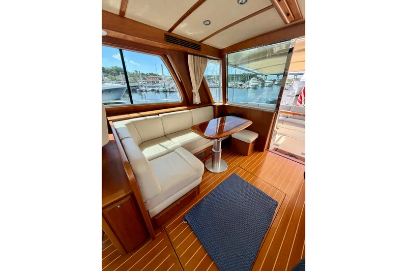 Slide: The Image of Interior of 2016 Sabre 48 Salon Express yacht with elegant seating and wooden finishes. - 42