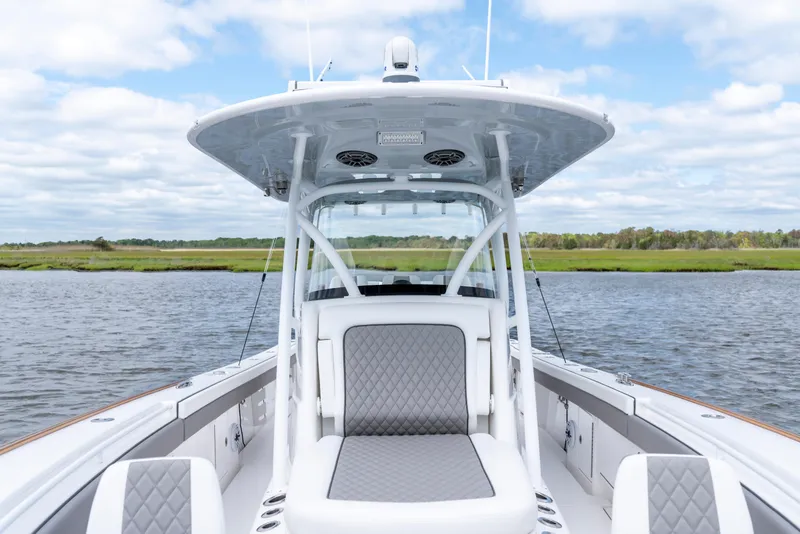 Slide: The Image of 2025 Valhalla Boatworks V-33 on water, showcasing sleek design and comfortable seating. - 18