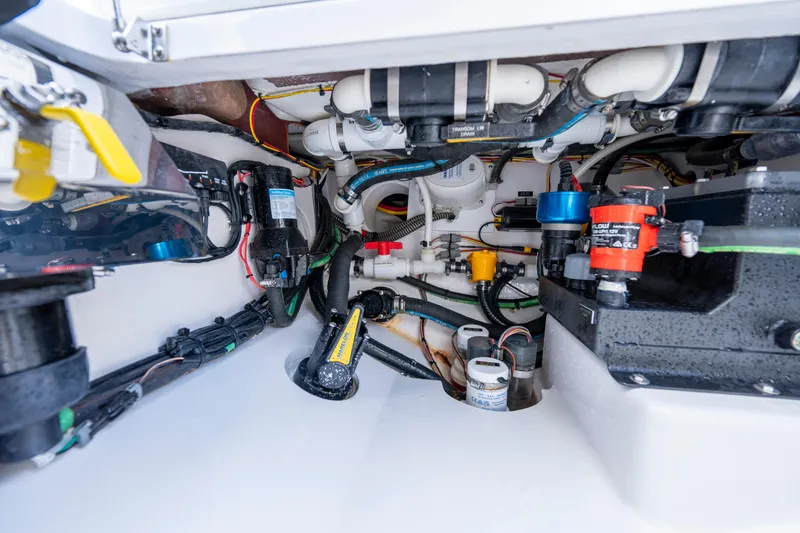 Slide: The Image of Engine compartment of 2025 Valhalla Boatworks V-33, showcasing intricate wiring and plumbing systems. - 28