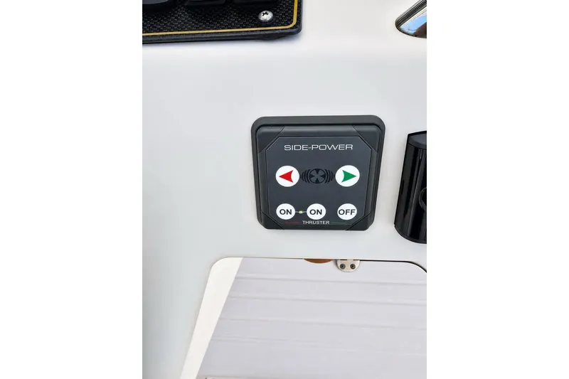 Slide: The Image of Control panel for Side-Power thruster on 2014 Grady-White Canyon 306 boat. - 13