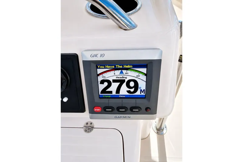 Slide: The Image of Garmin GHC 10 marine display on 2014 Grady-White Canyon 306 boat dashboard. - 14
