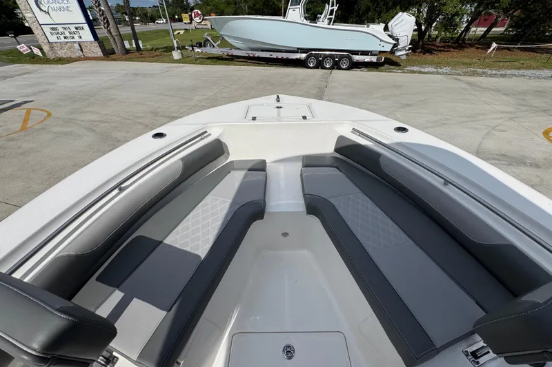 Slide: The Image of 2027 Sea Born LX22 Center Console boat with spacious seating and sleek design. - 17