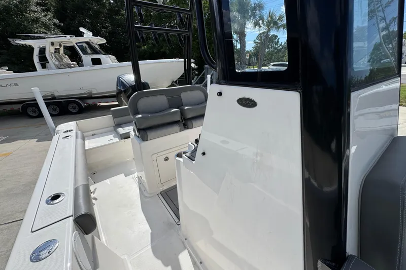 Slide: The Image of 2027 Sea Born LX22 Center Console boat interior with seating and console details. - 23