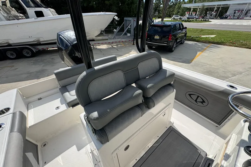 Slide: The Image of 2027 Sea Born LX22 Center Console boat interior with dual seating and steering wheel. - 26