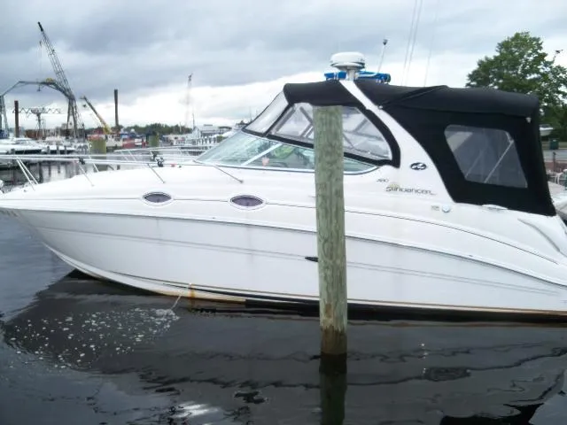 Slide: The Image of 2002 Sea Ray Sundancer 280 docked at harbor. - 1