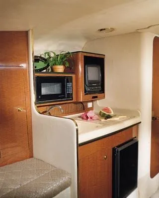 Slide: The Image of Galley area of 2002 Sea Ray Sundancer 280 yacht. - 11