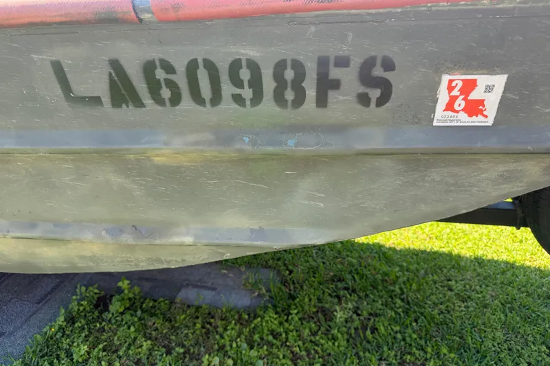 Slide: The Image of 2005 Southfork 1860 boat with registration number LA6098FS and Louisiana sticker. - 15