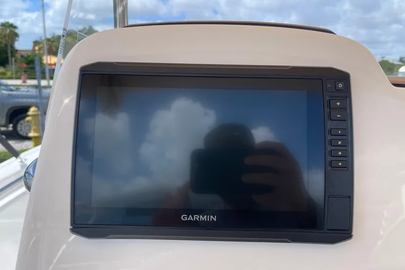 Slide: The Image of Garmin display on 2022 Tidewater 198 CC Adventure boat dashboard. - 16