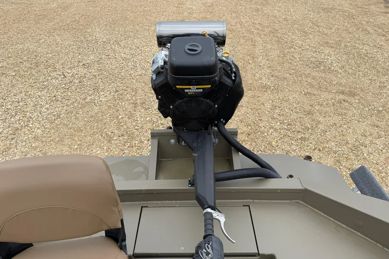 Slide: The Image of 2026 Excel 1860 Shallow Water F4 boat engine on gravel surface. - 21