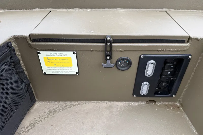 Slide: The Image of Control panel of 2026 Excel 1860 Shallow Water F4 boat with capacity label. - 22