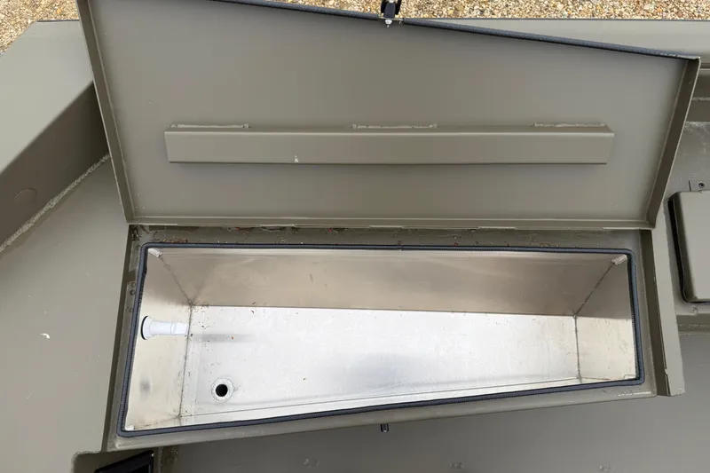 Slide: The Image of Open storage compartment in 2026 Excel 1860 Shallow Water F4 boat. - 23