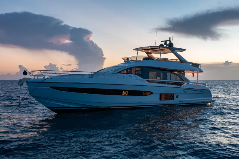 Slide: The Image of Luxurious 2022 Azimut 78 yacht at sunset on the ocean. - 10