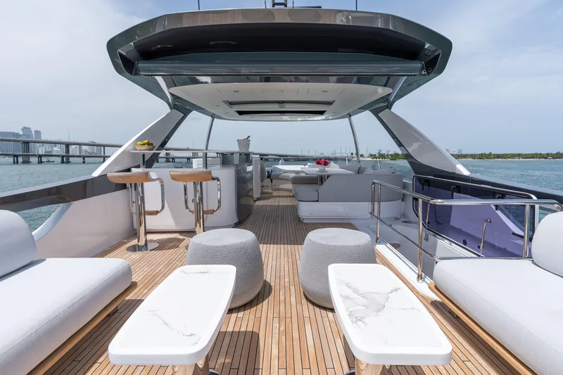 Slide: The Image of Luxurious 2022 Azimut 78 yacht deck with modern seating and ocean view. - 16