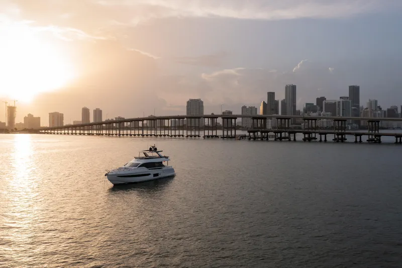 Slide: The Image of Luxury Azimut 78 yacht cruising at sunset near city skyline, 2022 model. - 18