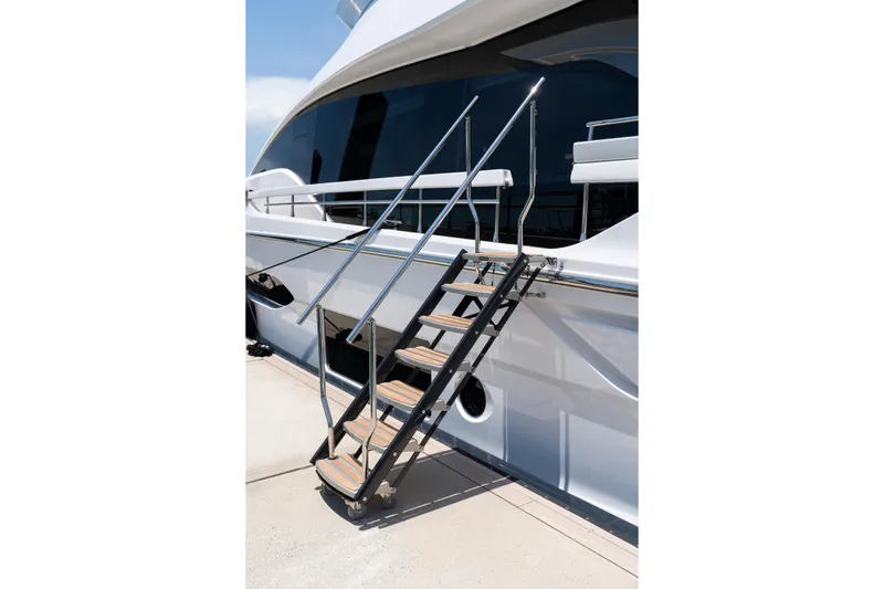 Slide: The Image of Luxury Azimut 78 yacht with sleek exterior and elegant boarding stairs, 2022 model. - 19