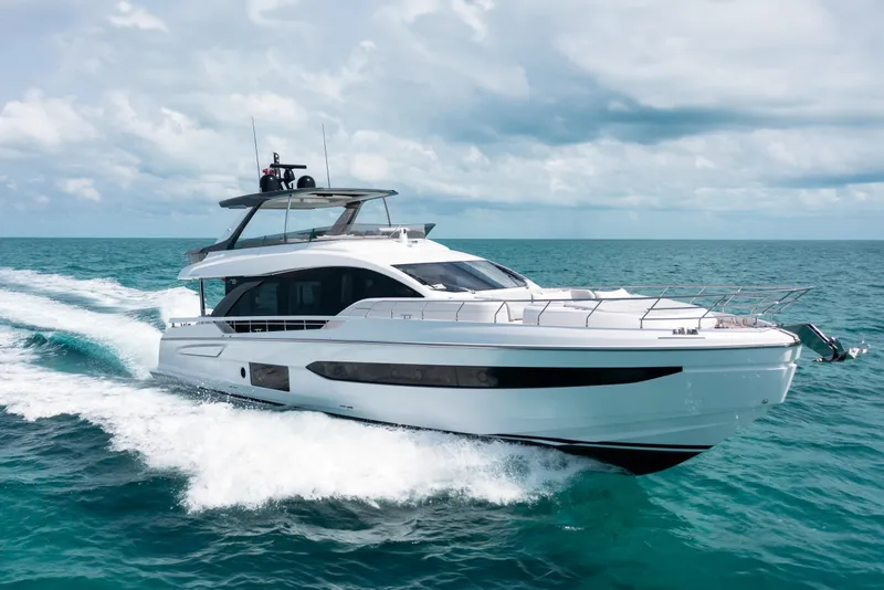 Slide: The Image of Luxurious 2022 Azimut 78 yacht cruising on open sea under cloudy sky. - 2
